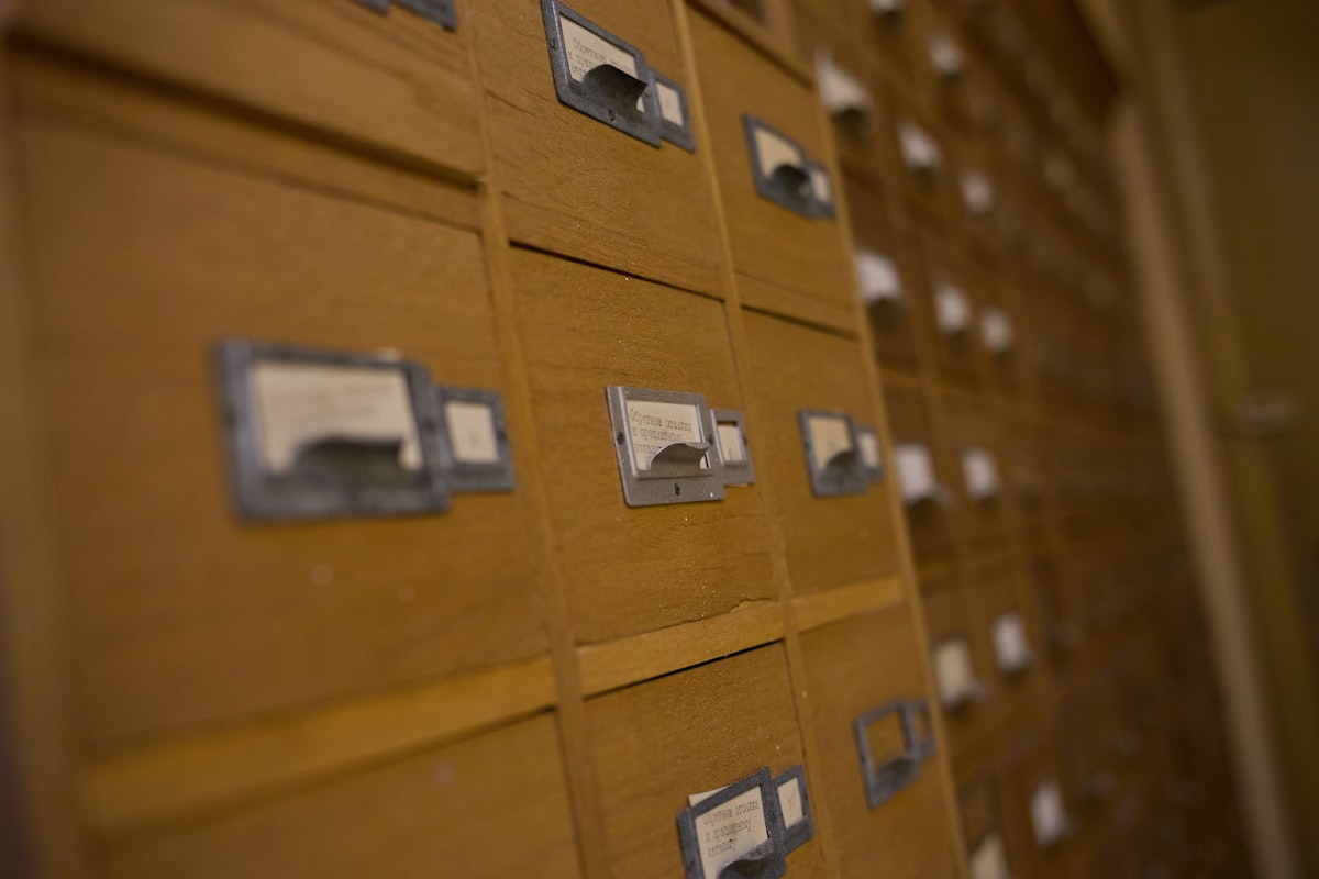 Wooden card catalog drawers with labels