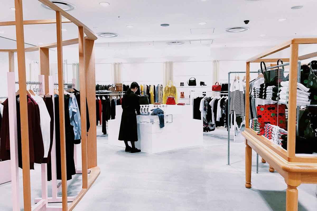 woman standing inside clothing area